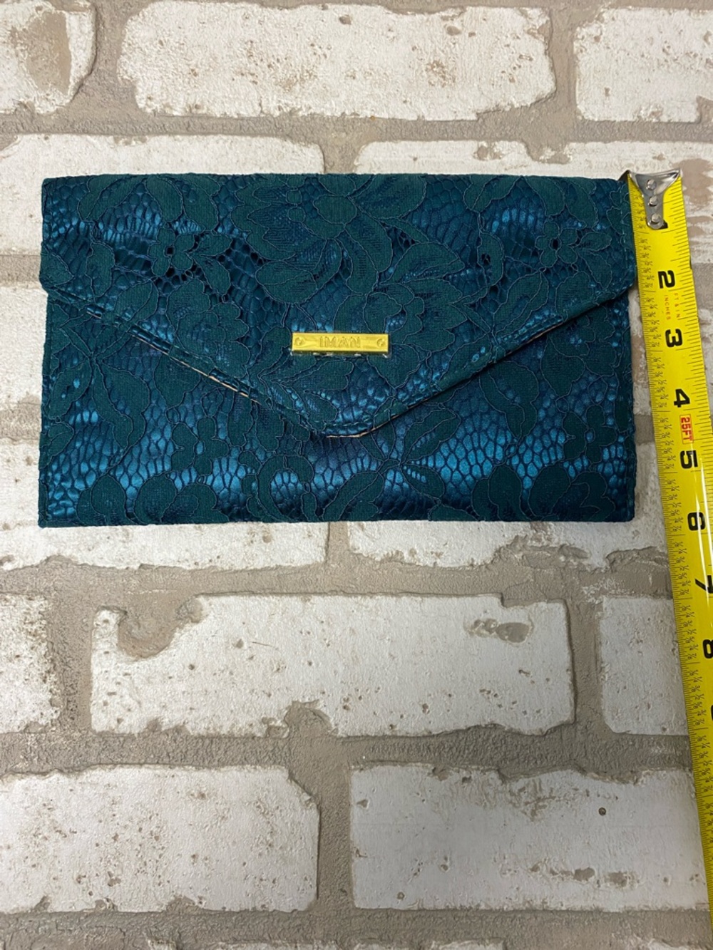 IMAN Teal Lace Envelope Clutch with Gold Plaque